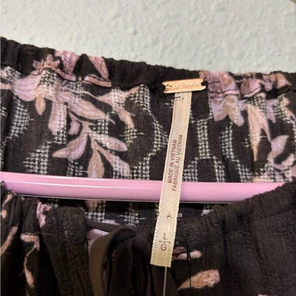 Free People NWT Sunbaked Ruffled Swing Tiered Mini Dress Washed Black Floral L - Picture 10 of 10